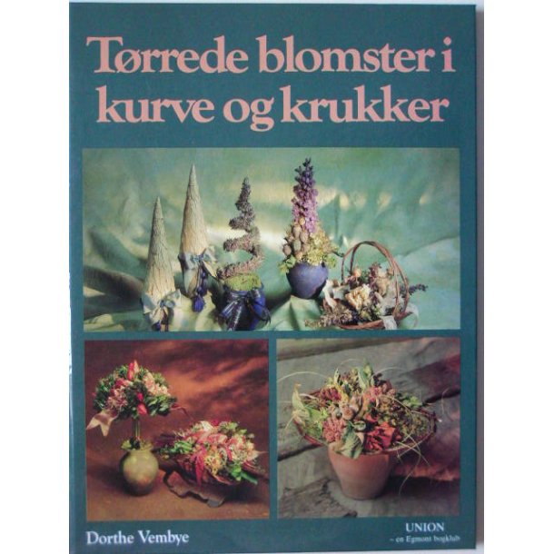 Trrede blomster i kurve og krukker